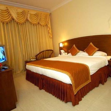 Aj International Hotell Bangalore Rom bilde