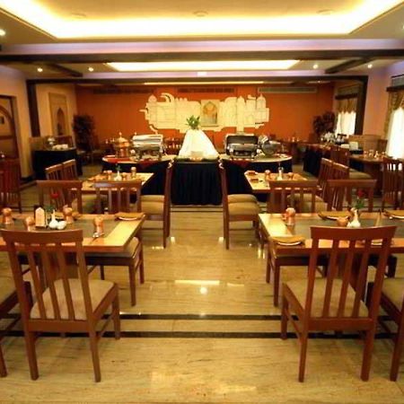Aj International Hotell Bangalore Restaurant bilde